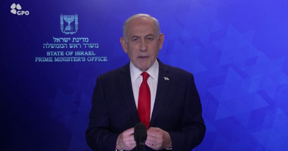 Netanyahu addresses the nation during the Iran war, February 2026. His subsequent March 12 press conference became the center of 'six fingers' AI conspiracy claims. Source: Al Jazeera/AFP.